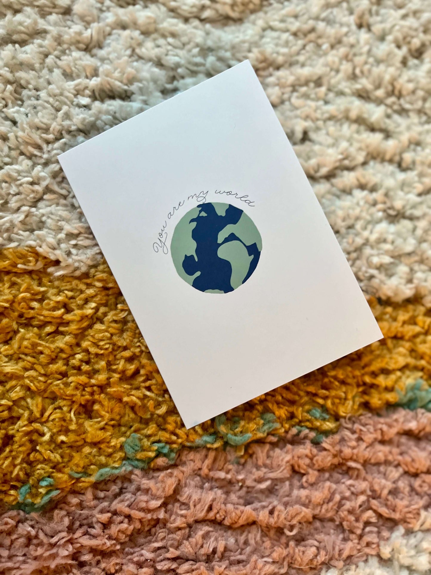 hand drawn anniversary valentines wedding greeting card that says you are my world with a earth.