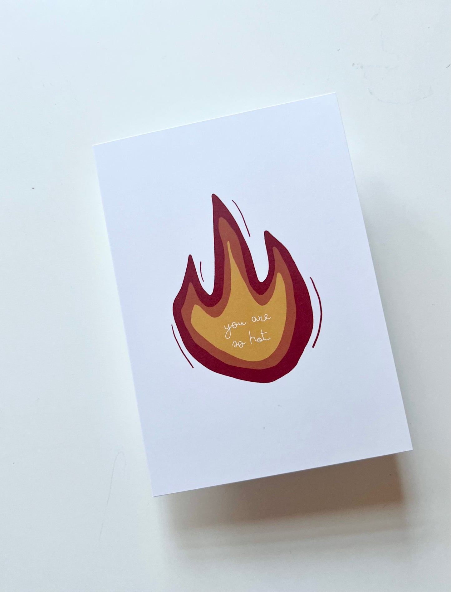 hand drawn greeting card with a red orange and yellow flame that says you are so hot.