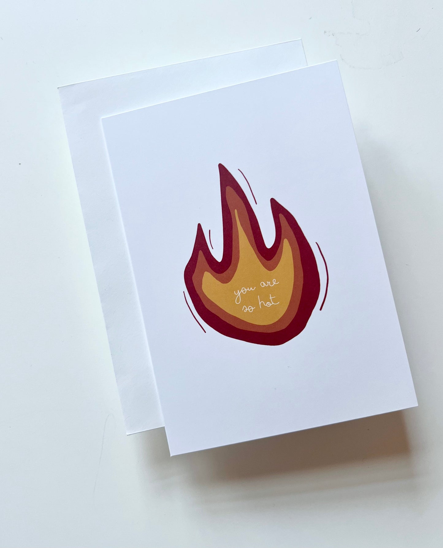 hand drawn greeting card with a red orange and yellow flame that says you are so hot.