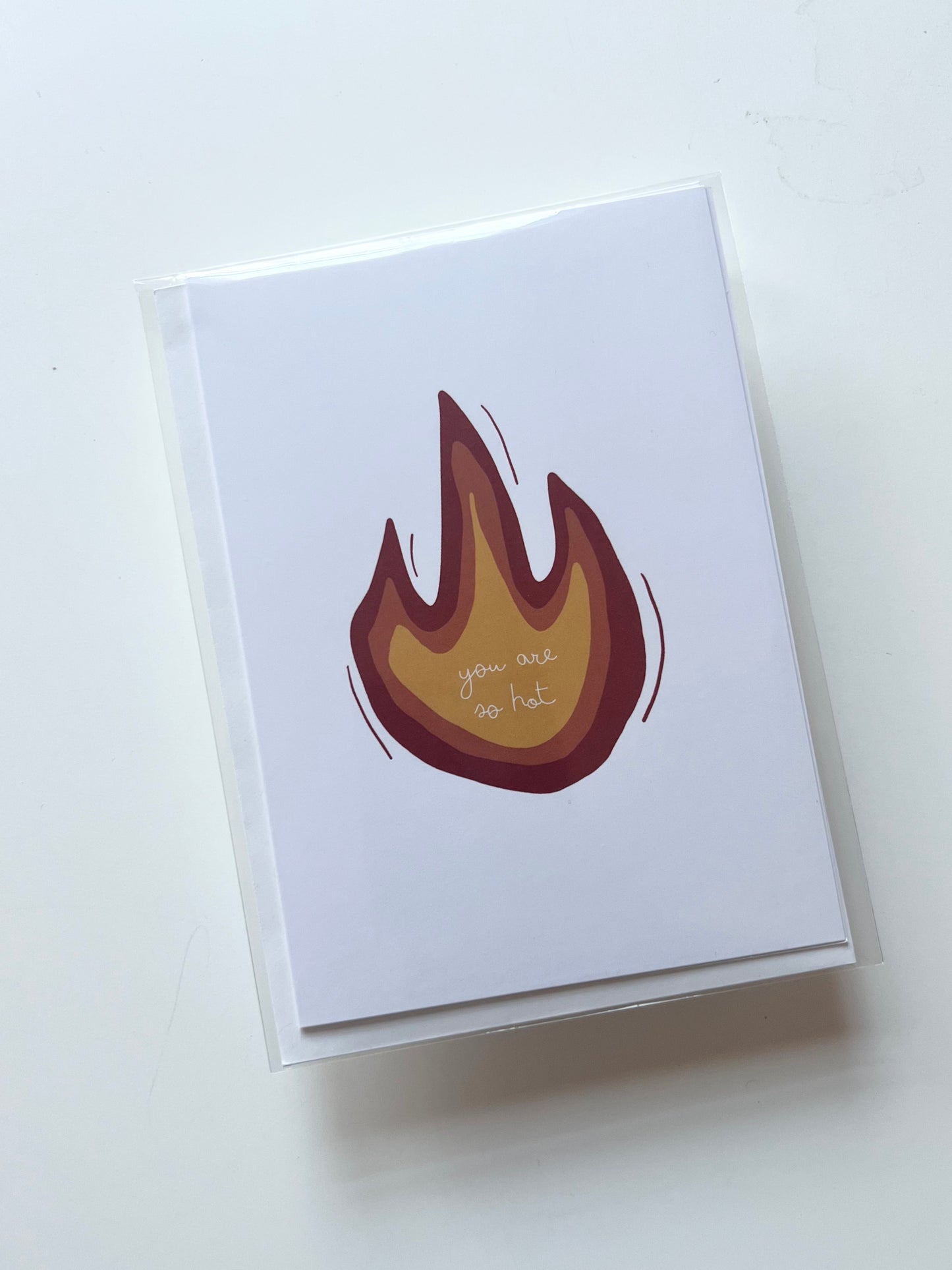 hand drawn greeting card with a red orange and yellow flame that says you are so hot.