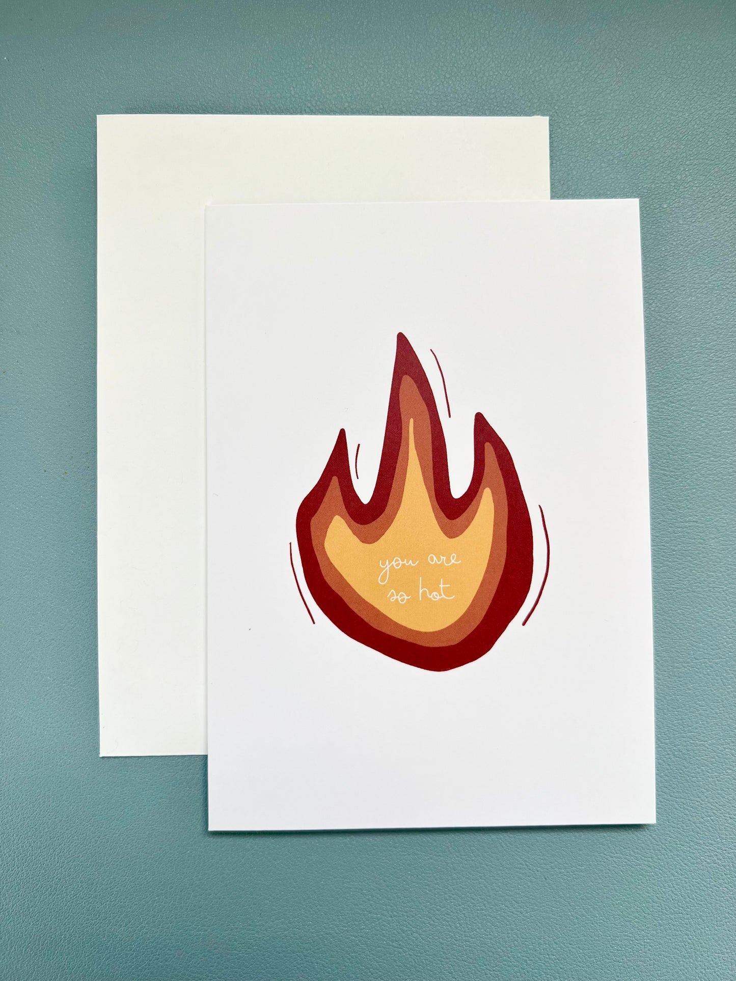 hand drawn greeting card with a red orange and yellow flame that says you are so hot.