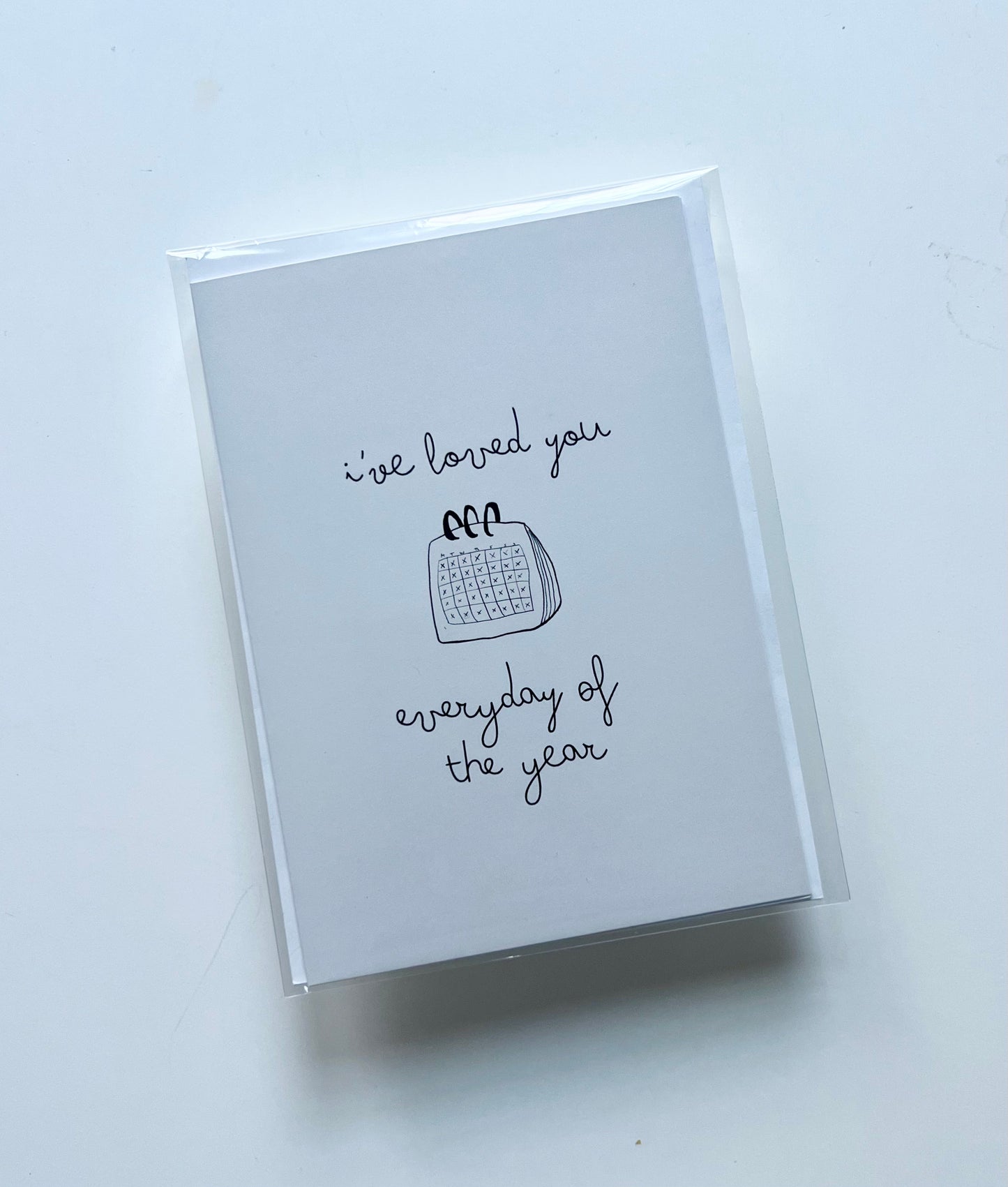 hand drawn black and white greeting card with a calendar that says I've loved you every day of the year.