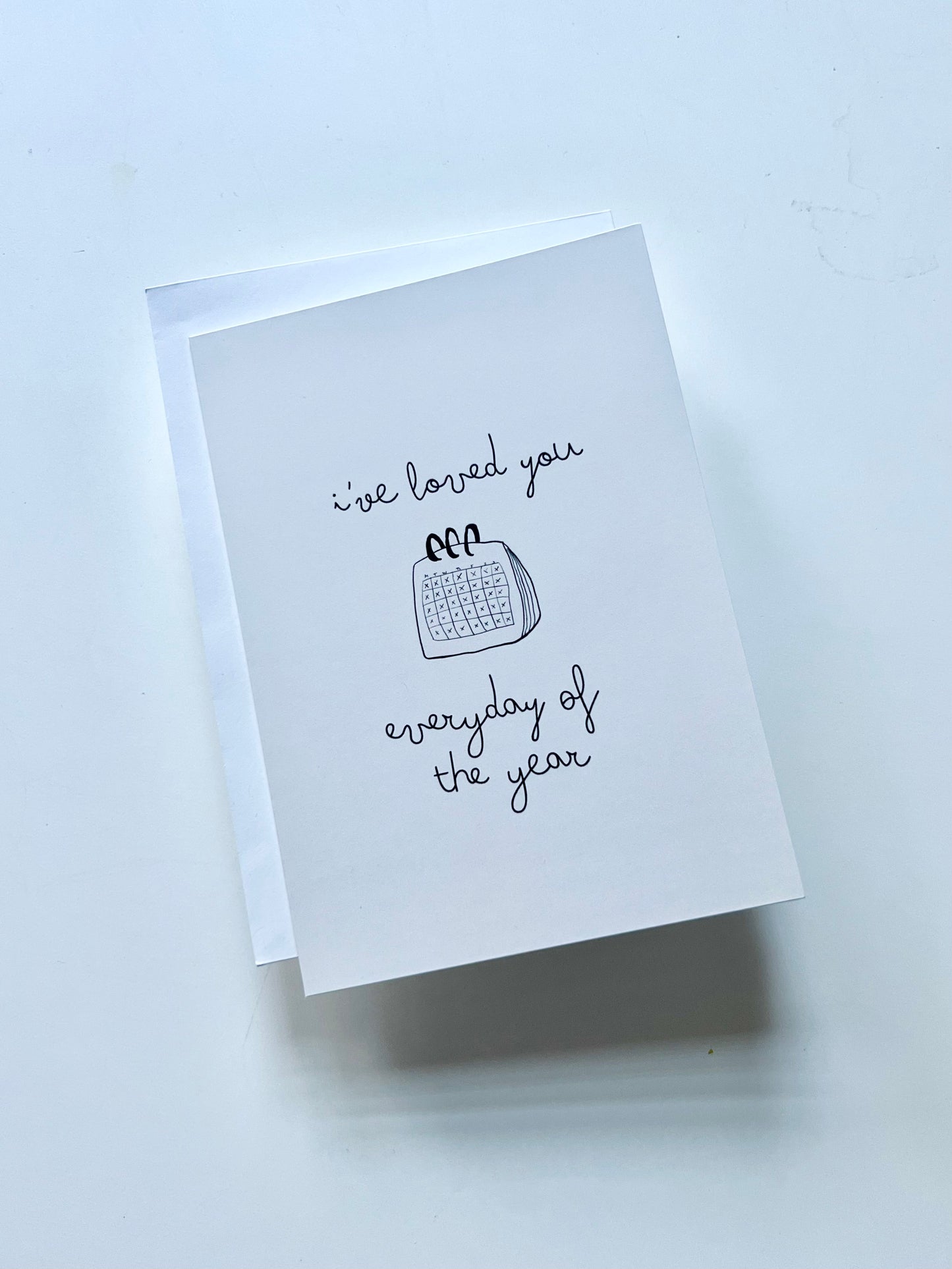 hand drawn black and white greeting card with a calendar that says I've loved you every day of the year.