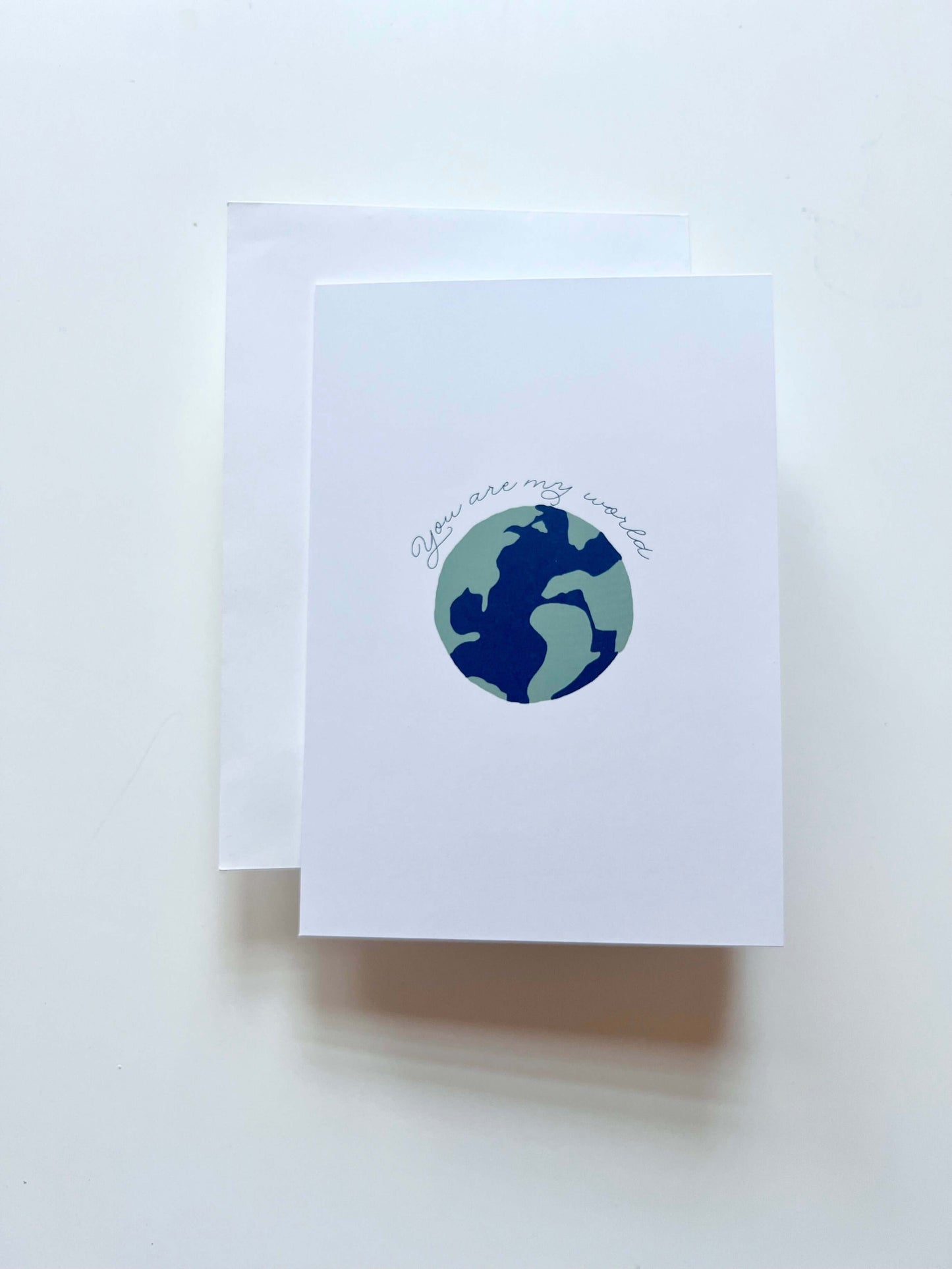 hand drawn anniversary valentines wedding greeting card that says you are my world with a earth. 