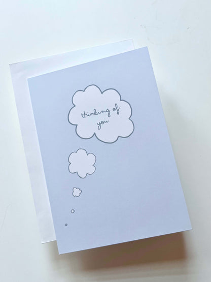 hand drawn blue thinking of you thought bubble greeting card