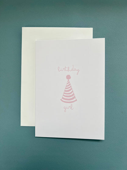 hand drawn happy birthday greeting card with pink party hat that says birthday girl.